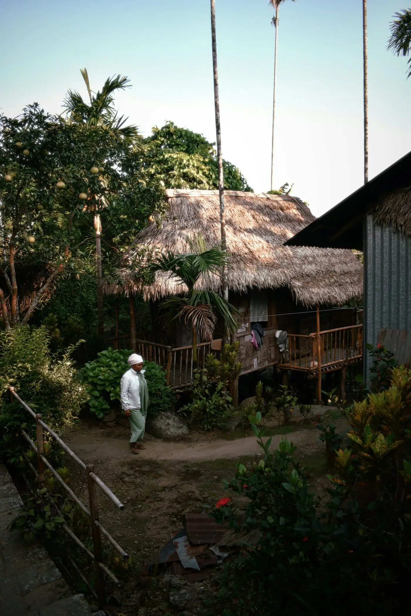 A thatched bamboo hut among the trees in Mawlynnong